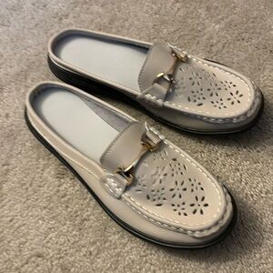 Leather slip on moccasin sz 39.  Gold bar accent